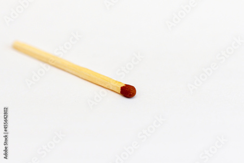 Closeup match on a white background with clipping path.matchstick flat lay,copy space,selective focus.