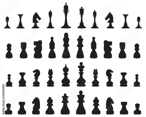 Black silhouettes of chess pieces on white background