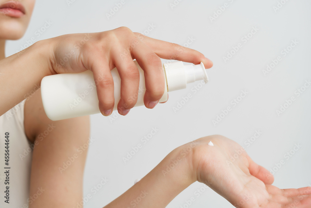 woman wear lotion burrow close-up clean skin woman wear lotion burrow close-up clean skin
