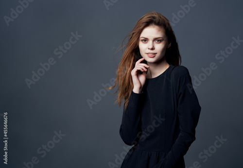 attractive woman beautiful hairstyle close-up dark background