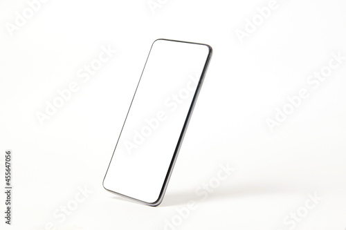 Mobile phone with blank screen on white background