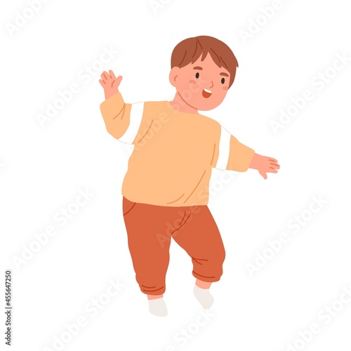 Little child start walking. Happy kid going. Smiling toddler running. Portrai...