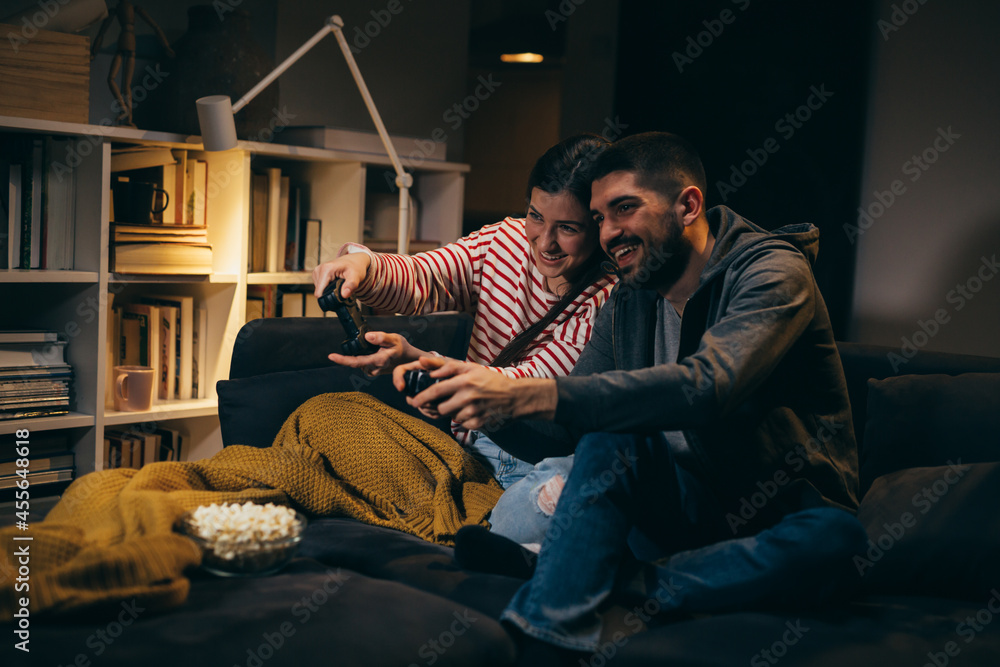 cute young couple enjoying time together at home
