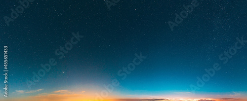 Real Colorful Night Sunset Sunrise Sky Stars. Night Starry Sky With Glowing Stars. Starry Backdrop Background. Panorama, Panoramic View © Grigory Bruev