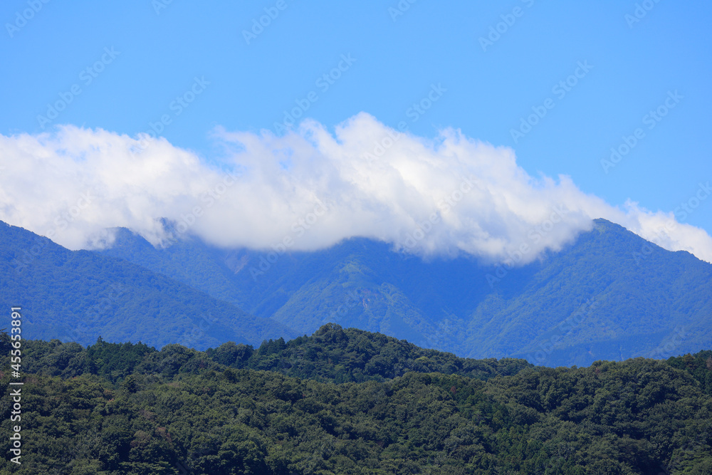 Fototapeta premium clouds over the mountains
