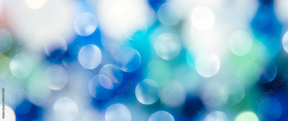 Bright blue-green abstract defocused background, round bokeh. Bright blue-green abstract defocused background, round bokeh.