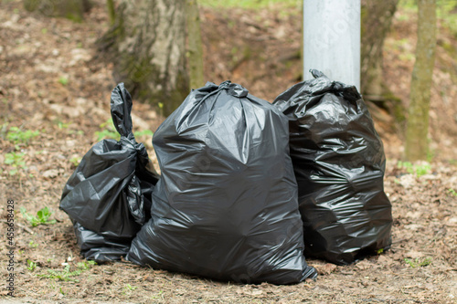 Black garbage bags. Waste plastic bags. © Олег Копьёв