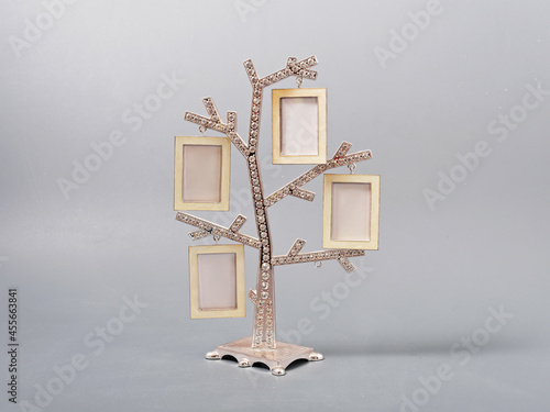 Fototapet stylish family tree with place for photo on gray background
