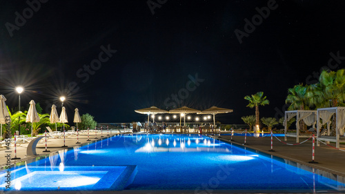 dinner beside the pool restaurant under the stars