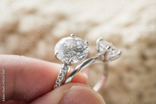 hand hold beautiful jewelry diamond ring photo