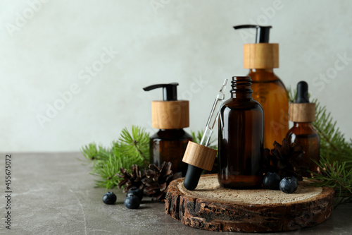 Natural spa cosmetics on gray textured table