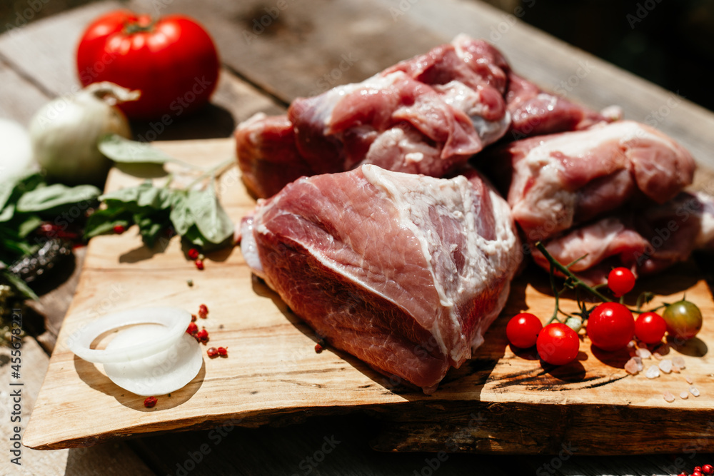 Pork pulp.raw piece of meat on a wooden board. Pork pulp.raw piece of meat on a wooden board.