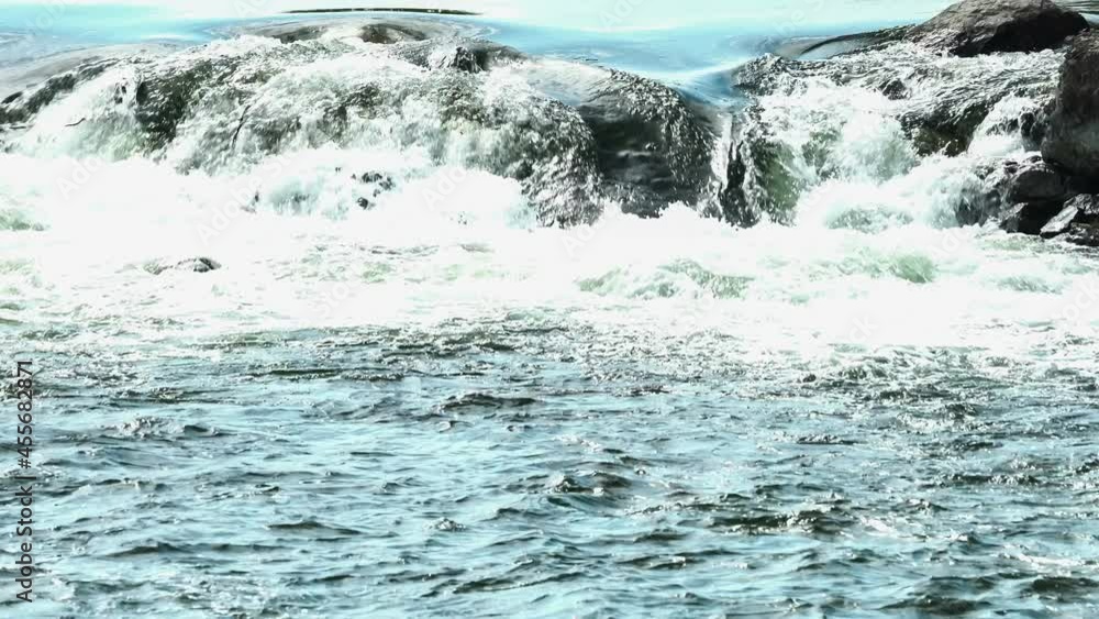 Wild River Flowing with Stone Boulders and Stone Rapids. Wild River Flowing with Stone Boulders and Stone Rapids.