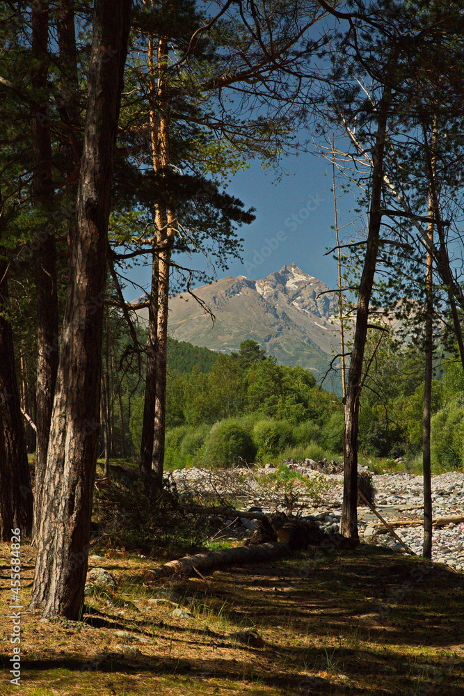 View of the peaks of the Caucasus Mountains in the vicinity of the village of Polyana Azu. View of the peaks of the Caucasus Mountains in the vicinity of the village of Polyana Azu.