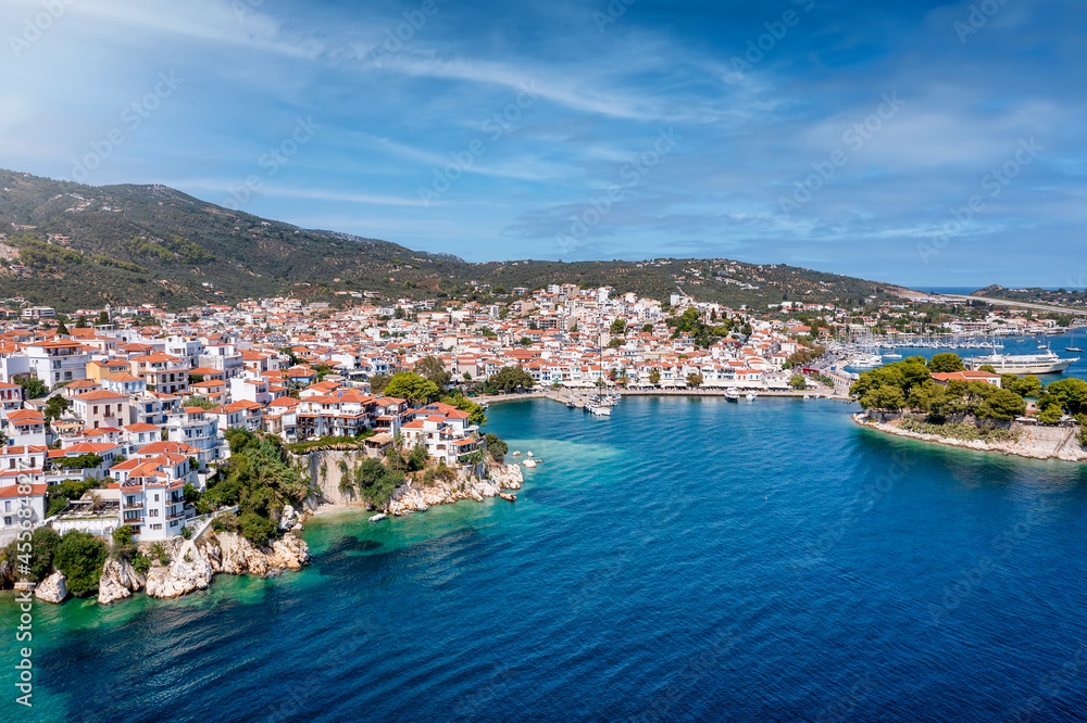 Fototapeta premium Aerial view to the idyllic town of Skiathos island, Sporades, Greece, during summer time