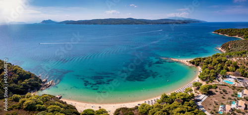 Fototapeta Naklejka Na Ścianę i Meble -  Panoramic aerial view of Banana Beach at Skiathos island, Sporades, Greece, with pristine sandy coast and emerald sea