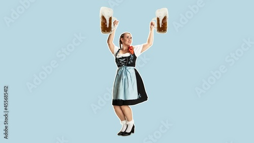 Wallpaper Mural Stop motion design or art animation. The young happy sexy woman wearing a Bavarian dirndl with lot of beer mugs over color traditional background. The celebration, oktoberfest, festival, party concept Torontodigital.ca