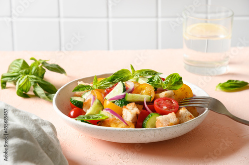 Tuscan Panzanella with tomatoes and bread. Traditional Italian cuisine. Vegetarian panzanella salad. Mediterranean healthy food.