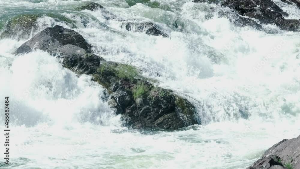 Wild River Flowing with Stone Boulders and Stone Rapids. Wild River Flowing with Stone Boulders and Stone Rapids.