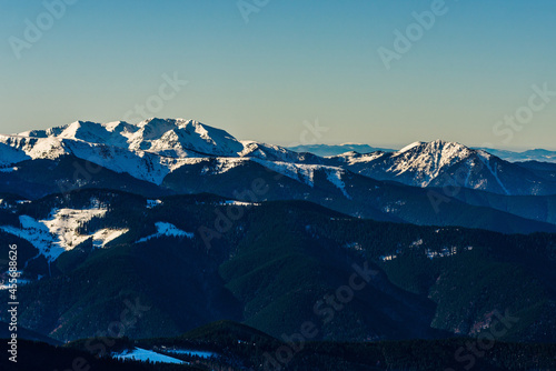 Beautiful view of winter mountain peaks covered with snow