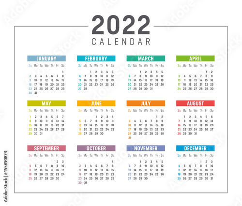 Colorful year 2022 calendar isolated on white background. Week starts Sunday. Vector template.