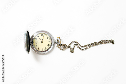 old pocket watch on white background