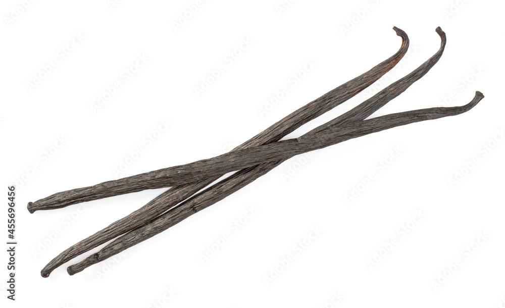 Dried vanilla pods isolated on white background, top view Dried vanilla pods isolated on white background, top view