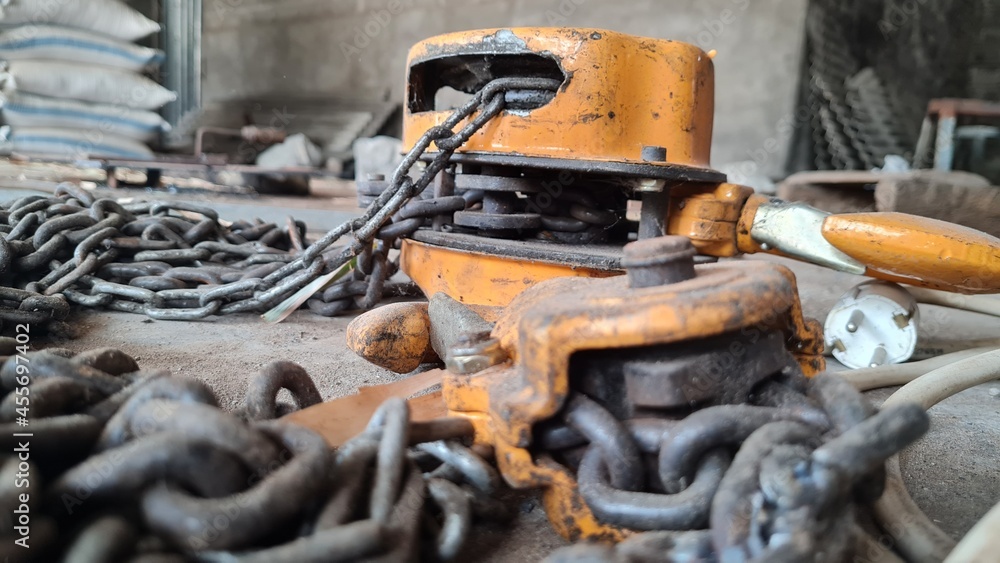 Old rusty winch chain Manual chain hoist.