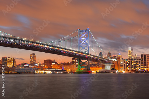 Philadelphia, Pennsylvania, USA skyline on the Delaware river with Ben Franklin Bridge photo