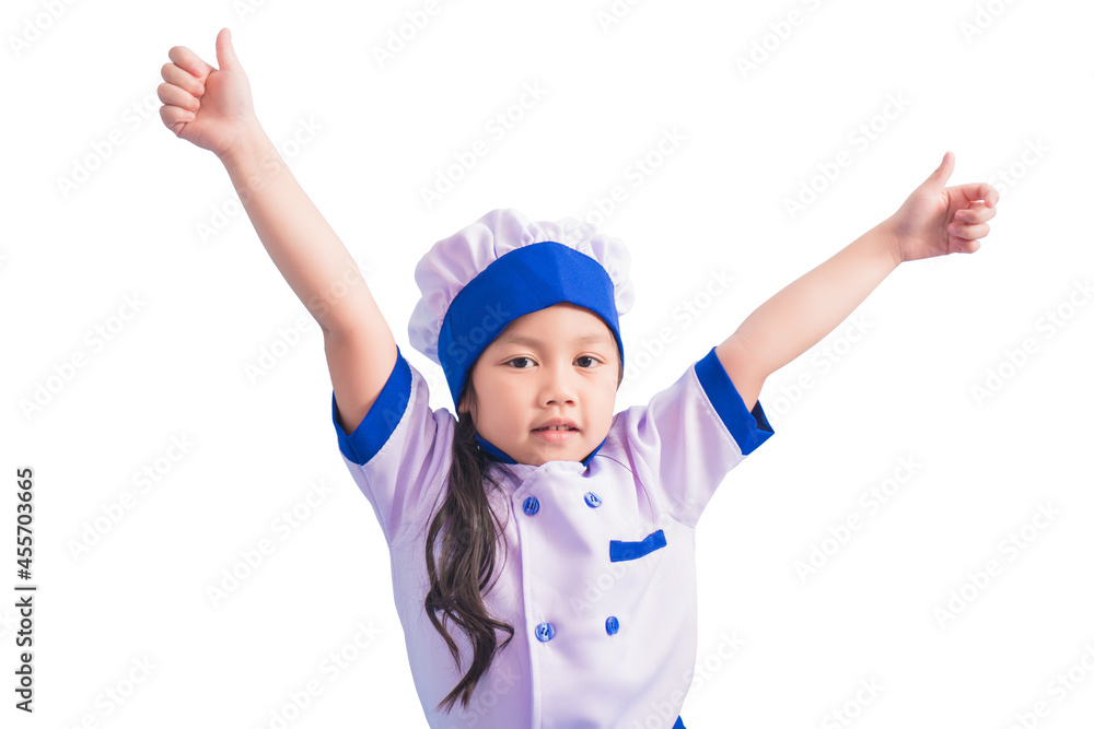 Happy girls with amazing smile in clothes and chef cap. child dreams of becoming a chef Happy girls with amazing smile in clothes and chef cap. child dreams of becoming a chef