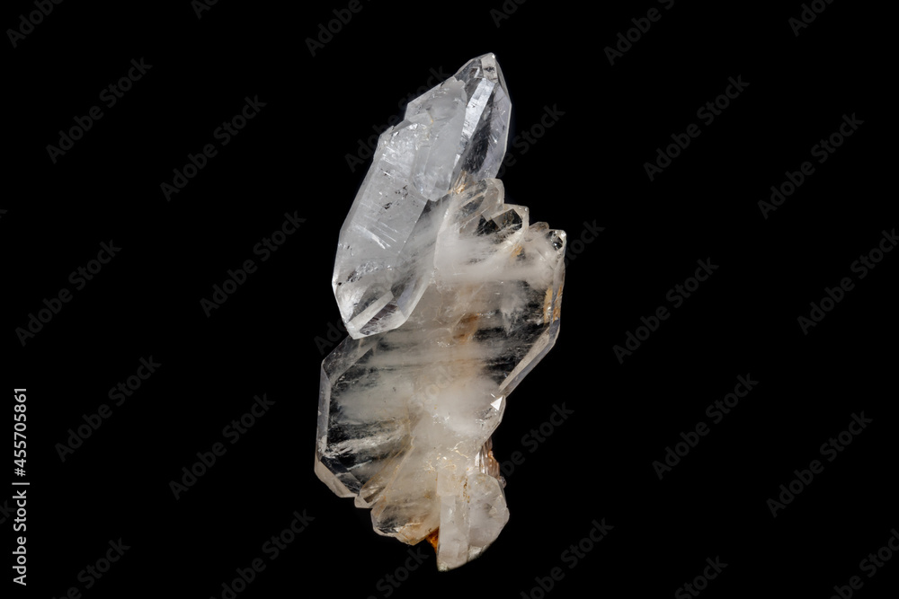 Macro mineral stone Flattened crystal of rock crystal on a black background Macro mineral stone Flattened crystal of rock crystal on a black background