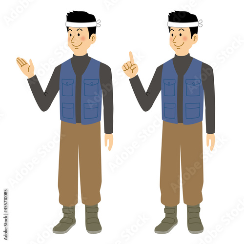 紹介＆説明ポーズをする大工の男性
