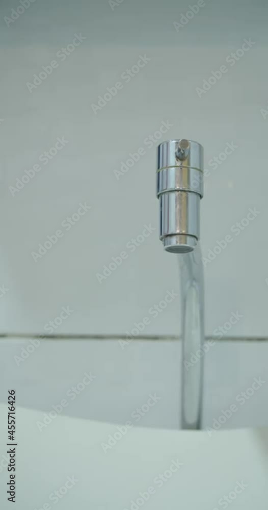 Dripping faucet. Bathroom water waste. Water waste concept. Water saving concept. Rationing and conscientious use.
Dripping faucet. Bathroom water waste. Water waste concept. Water saving concept. Rationing and conscientious use.