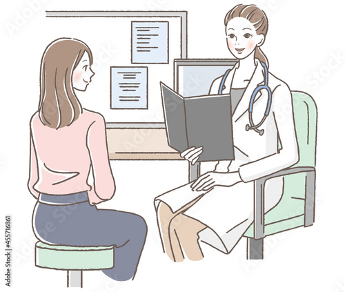 患者を診察する女性の医者