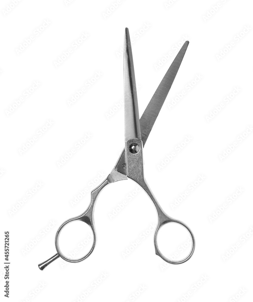 Professional hairdresser scissors isolated on white. Haircut tool Professional hairdresser scissors isolated on white. Haircut tool