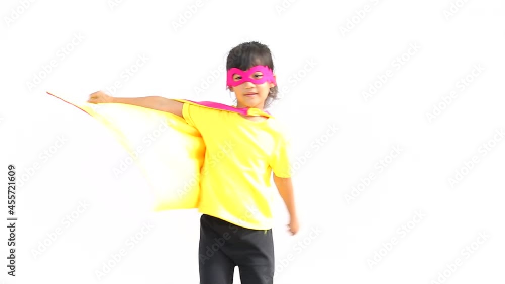 Earth day concept. A cute little girl joy and childhood have confidence action with dressed and wearing mask and cape of superhero kid.Children dream and imagination. Earth day concept. A cute little girl joy and childhood have confidence action with dressed and wearing mask and cape of superhero kid.Children dream and imagination.