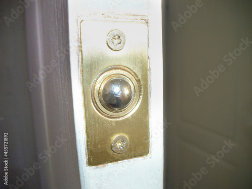 Close-up of a door ball lock installed in a house