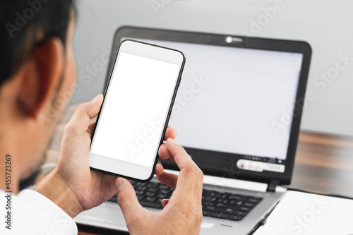 Man using mobile smartphone computer