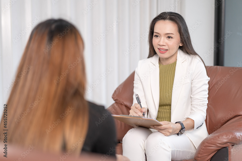 Asian professional psychologist doctor consults in psychotherapy session or counsel diagnosis health. Psychology and mental therapy concept concept Asian professional psychologist doctor consults in psychotherapy session or counsel diagnosis health. Psychology and mental therapy concept concept