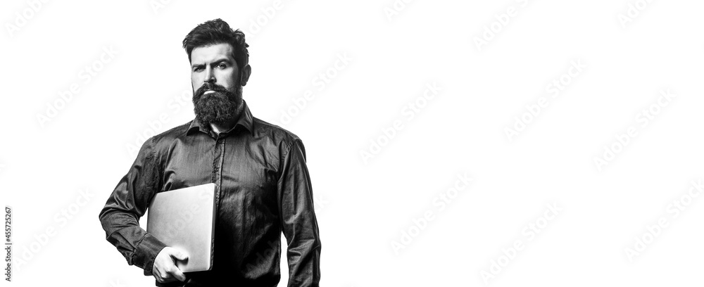 Holding laptop computer. Serious handsome bearded man worker laptop. Young businessman using his laptop, pc. Black and white Holding laptop computer. Serious handsome bearded man worker laptop. Young businessman using his laptop, pc. Black and white