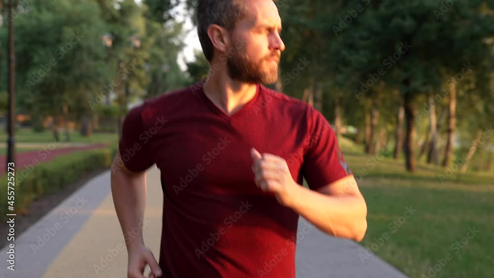mature guy running in the evening outdoor facing sunrise, success mature guy running in the evening outdoor facing sunrise, success