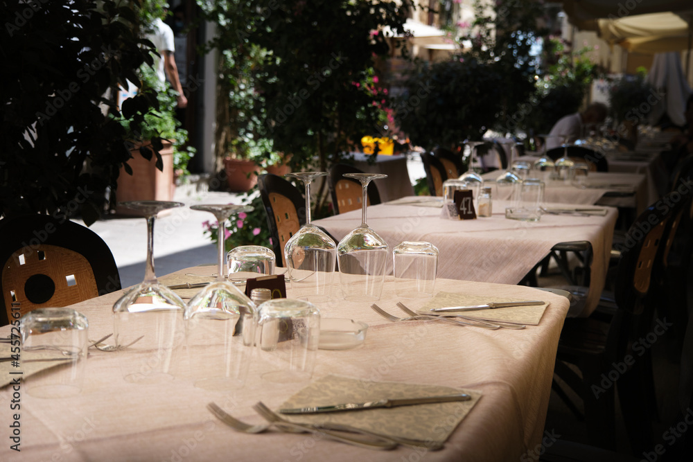 tables set outdoors in a restaurant