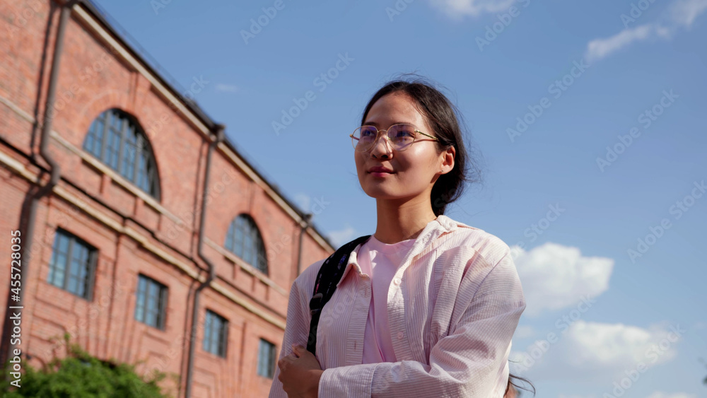 Portrait of asian university female student outdoor. Portrait of asian university female student outdoor.