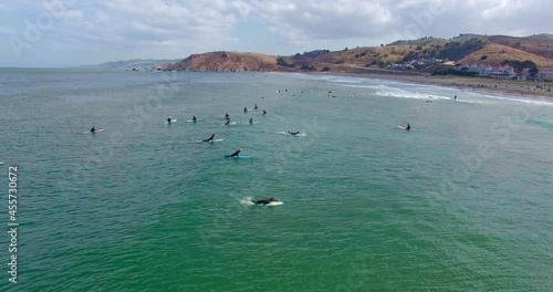 Aerial: Surfers in the water at Pacifica, San Francisco, California, USA