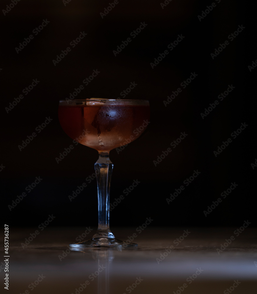 Delicious elegant orange cocktail in top bar restaurant in bogota colombia