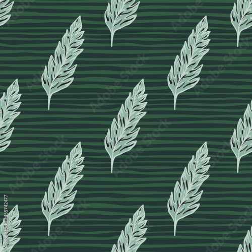 Green leaf seamless pattern on stripe background. Leaves ornament. Foliage backdrop © smth.design