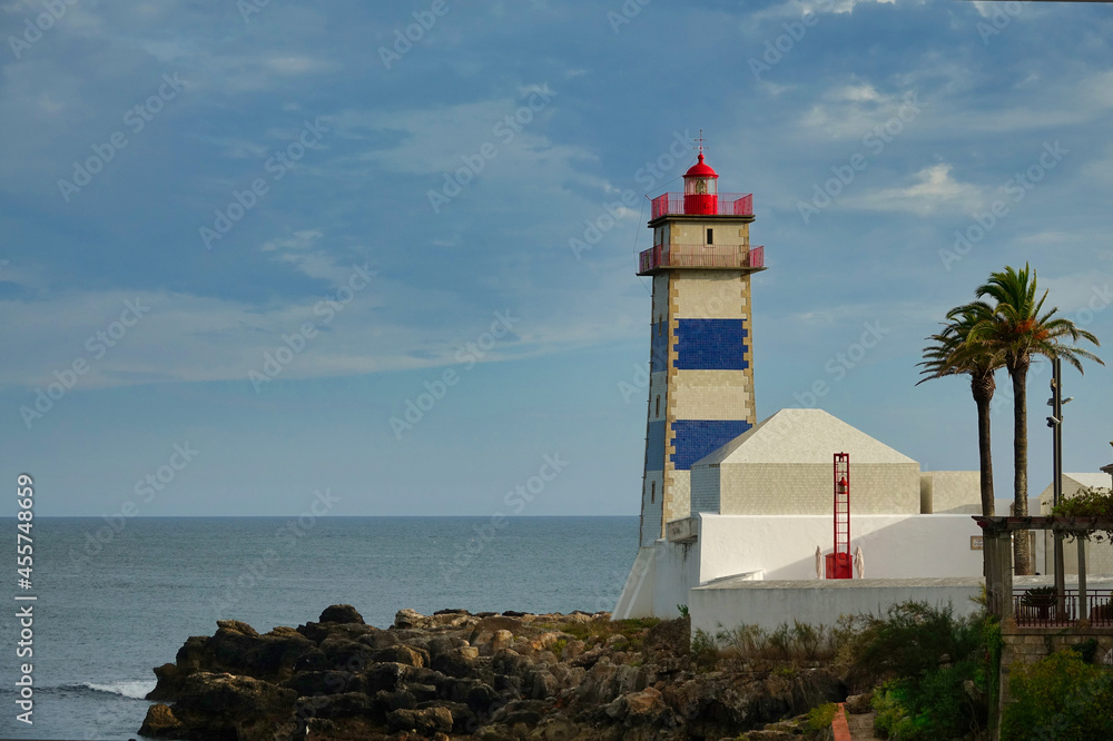 Lighthouse of Santa Marta in Cascais (Portugal) at sunset