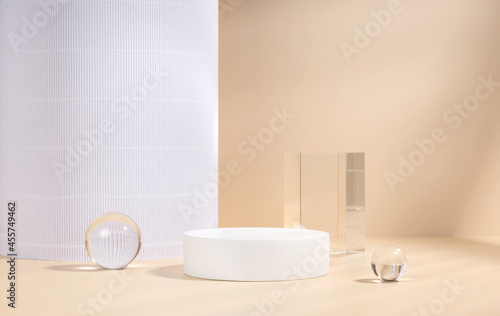 Skincare and cosmetic product showcase stand photography for online marketing include crystal ball and white stand on beige background
