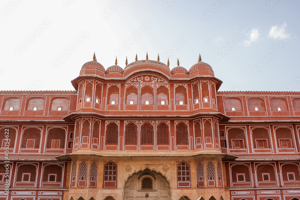 The exterior facade of the ancient City Palace in the city of Jaipur in Rajasthan, India.