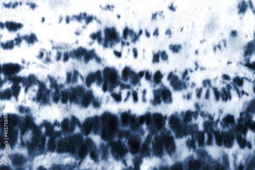 Tie dye shibori pattern. Hand painted ornamental indigo blue navy colored elements on white background.